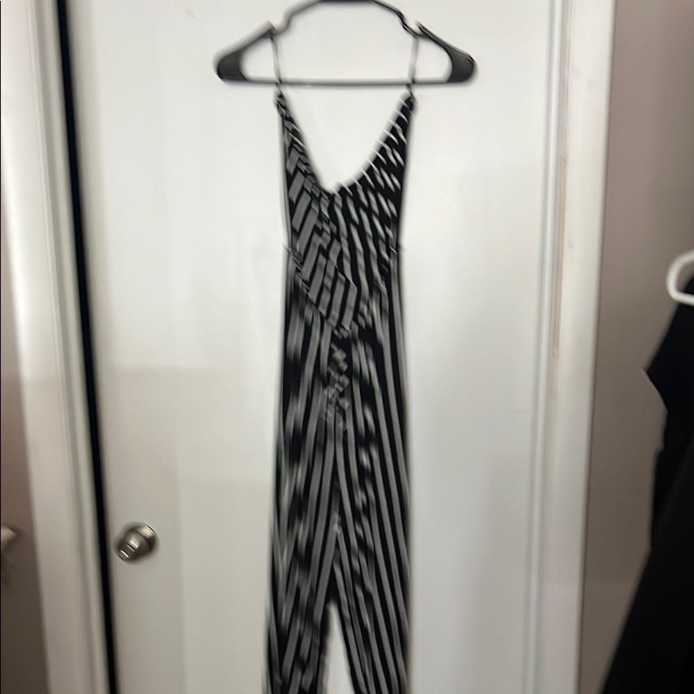 Cute black and white strapless jumpsuit. Good condition.